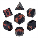 Set of black polyhedral dice with red glittering edges on a white background
