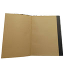 Open notebook with textured cover featuring dragon eyes on a white background