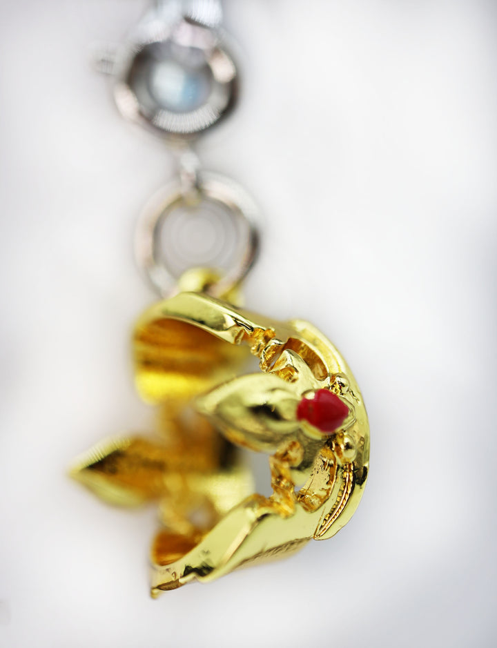 Traveler's Trinkets: Flame Crown Charm | D20 Games