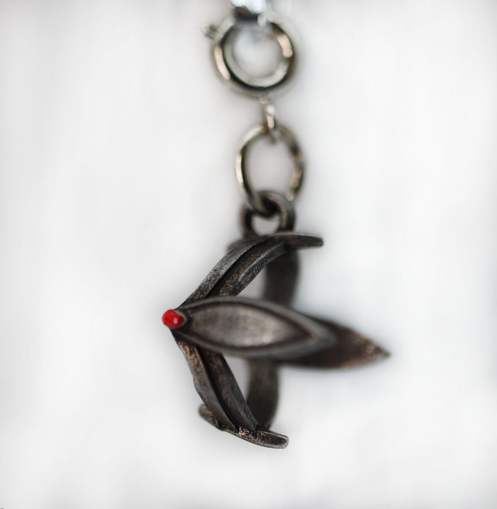 Traveler's Trinkets: Iron Crown Charm