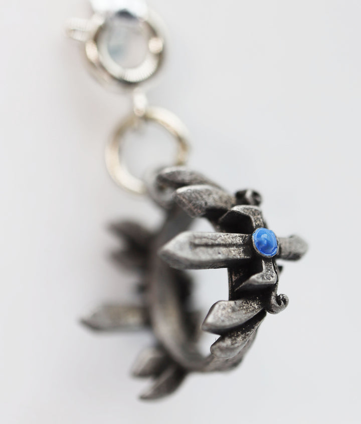 Traveler's Trinkets: Sword Crown Charm | D20 Games