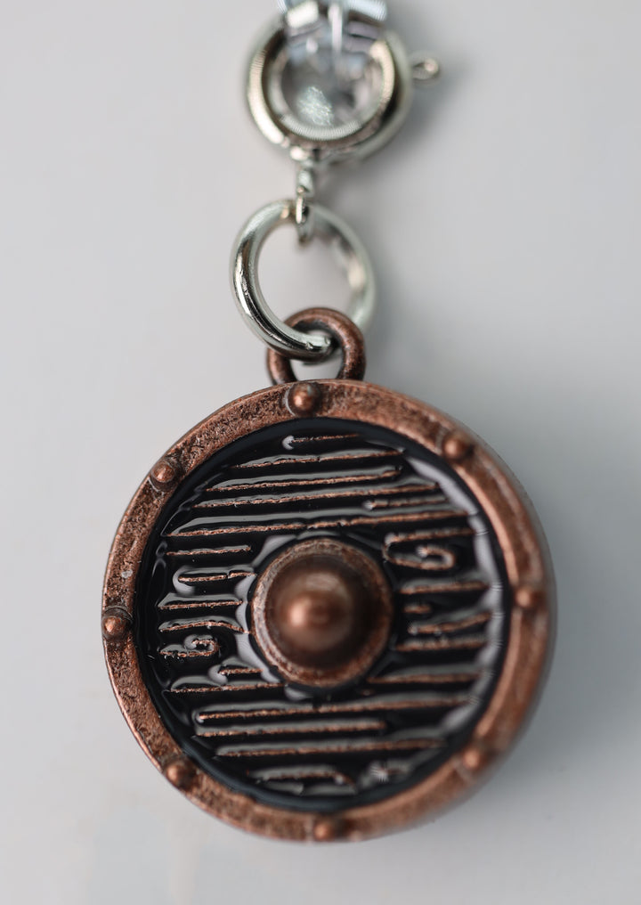 Traveler's Trinkets: Buckler Shield Charm | D20 Games