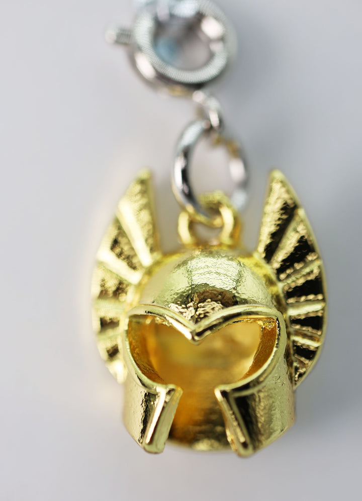 Traveler's Trinkets: Cleric Helm  Charm | D20 Games