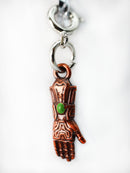 Traveler's Trinkets: Forged Gauntlet Charm