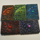 Set of dragon eye designs on textured backgrounds