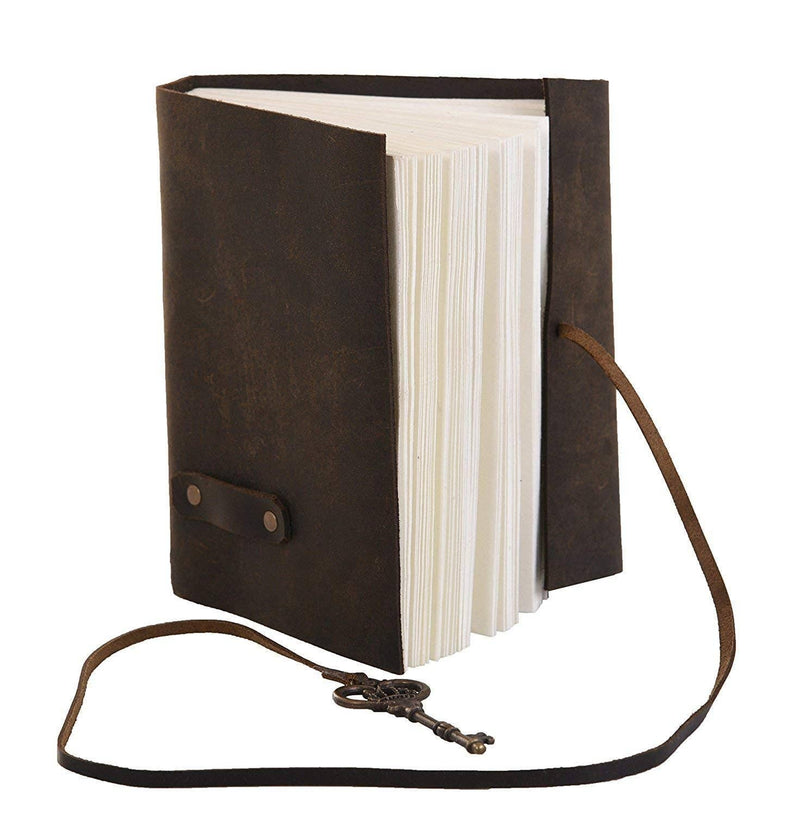Brown leather notebook with a strap on a white background